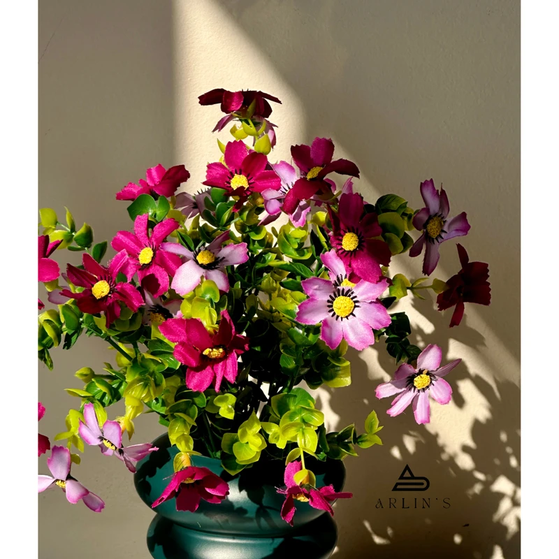 artificial flower with plastic flower vase