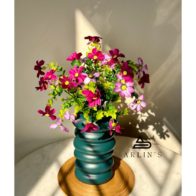 artificial flower with plastic flower vase