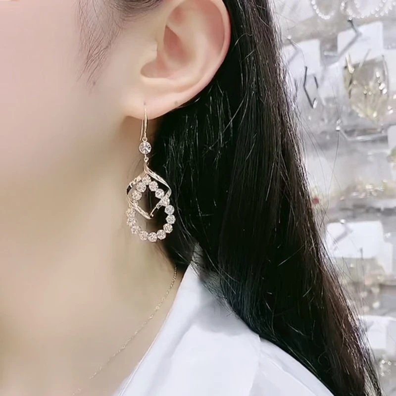 Gold Plated Cubic Zirconia CZ Twisted Dangle Drop Earrings - Image 3