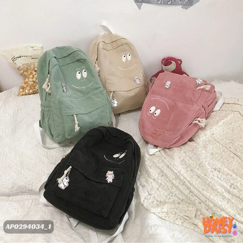 School corduroy backpack with smiley face