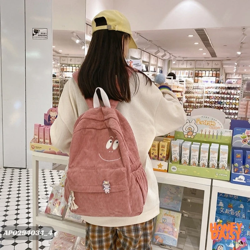School corduroy backpack with smiley face