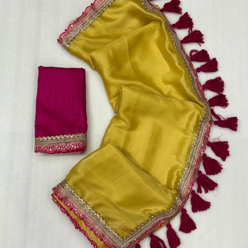 Trending Georgette Tissue Saree with fancy lace border